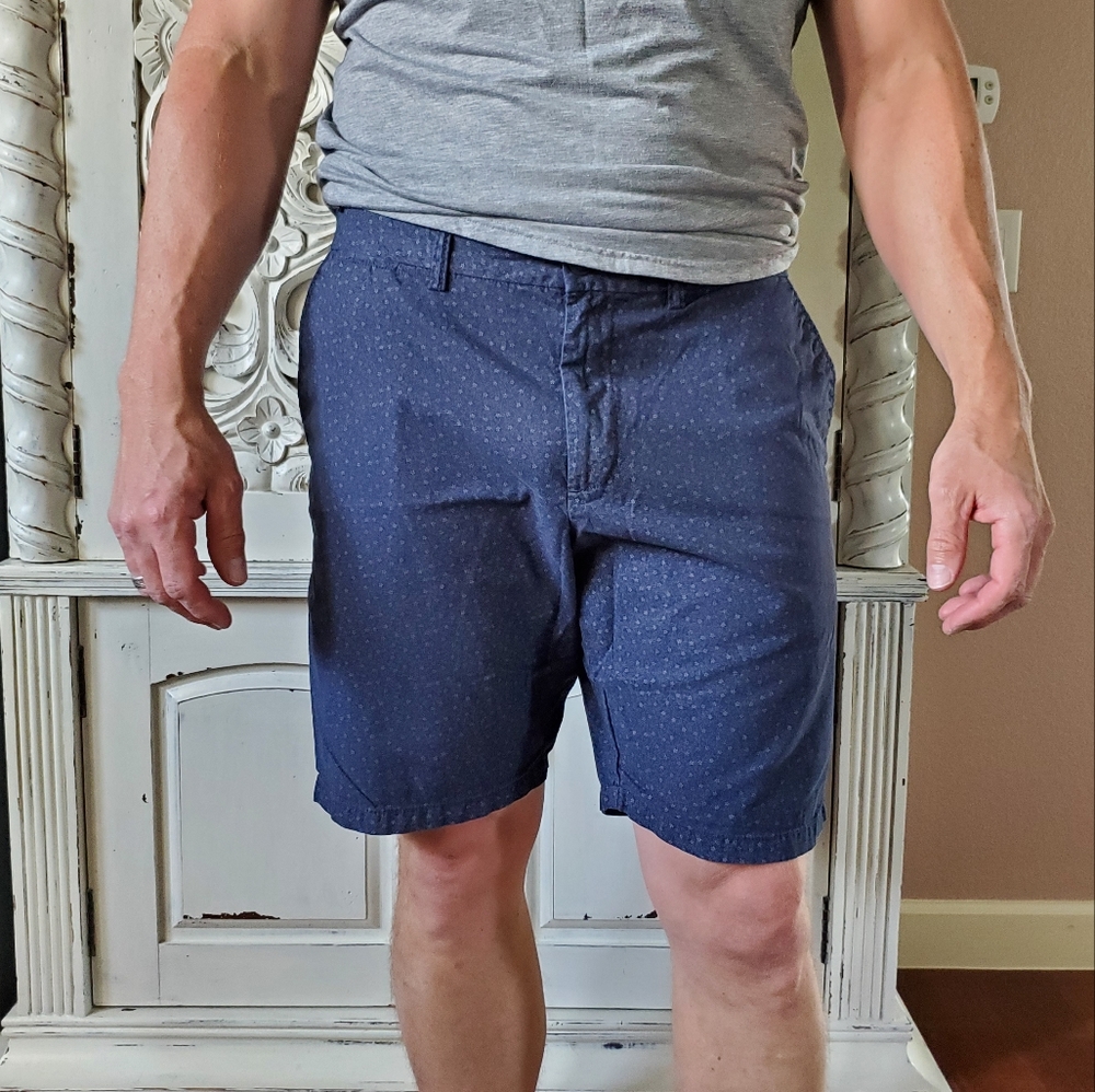Blue floral slim fit flat front shorts